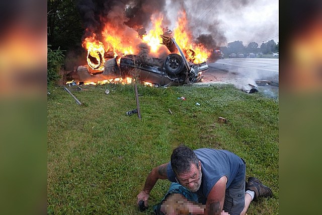 Hero Captured Rescuing Elderly Man From Burning Car in Epic Photo Identified