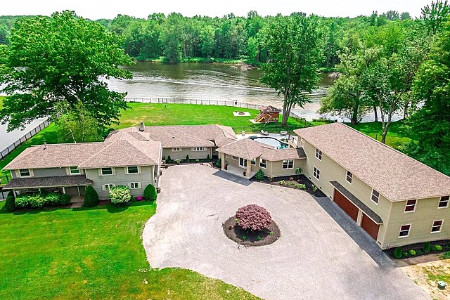 Check Out This Beautiful Home For Under $1 Million On The Water Near Sylvan Beach